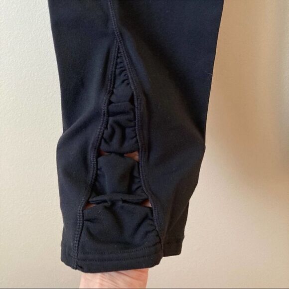 Athleta Power X's and O's Lace Calf Leggings Black M - Picture 7 of 9
